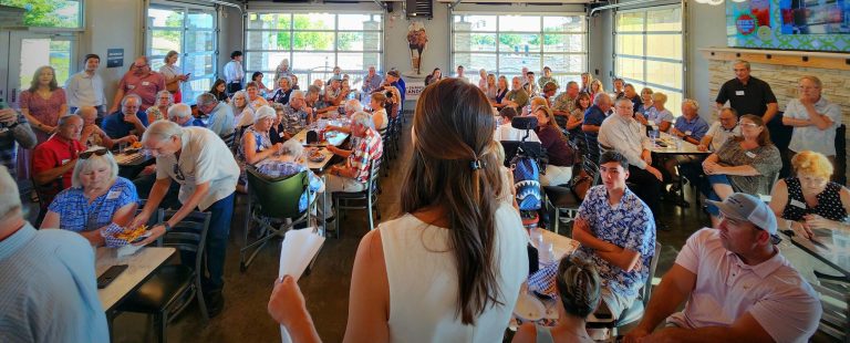 Shanti Landon giving speech to public