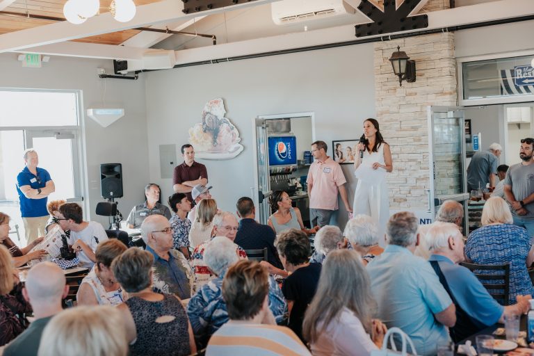 Shanti Landon give speech with community